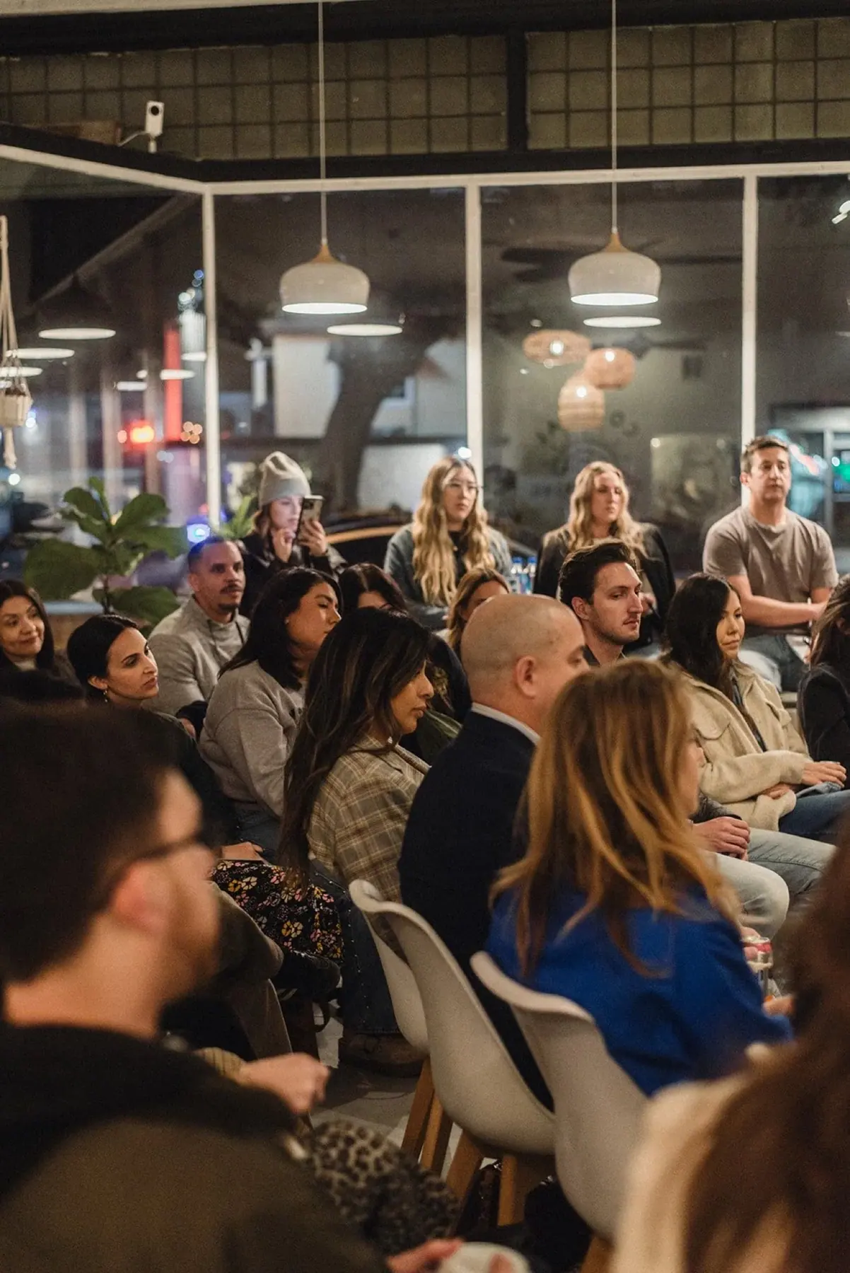 Guests gathering at a Coastal Coworking social event